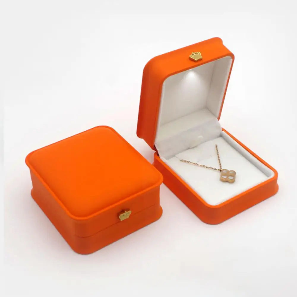 Caja de joyería con luz LED para anillos, collares y regalos