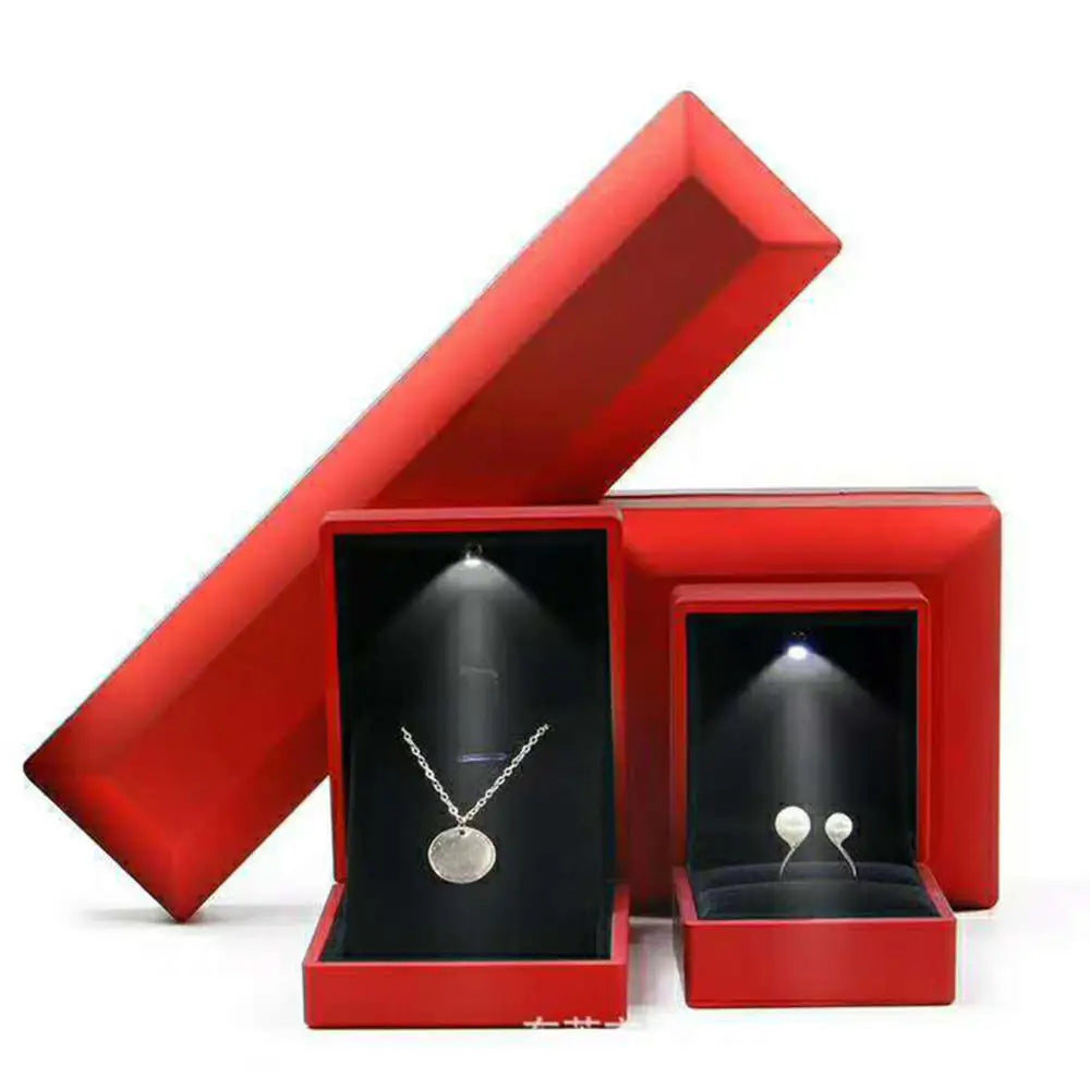 Caja de joyería con luz LED para anillos, collares y regalos
