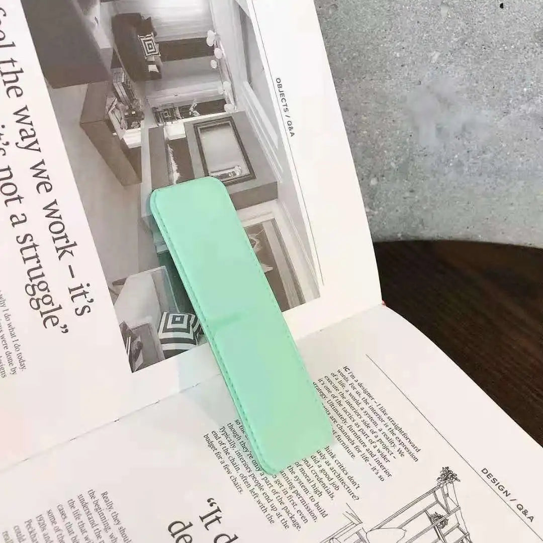 Soporte plegable adhesivo para móvil con anillo