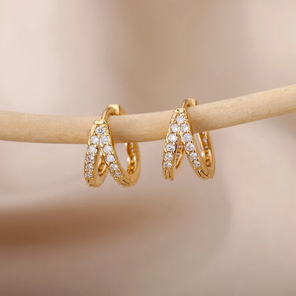Pendientes aro con estrella de circonita en acero inoxidable