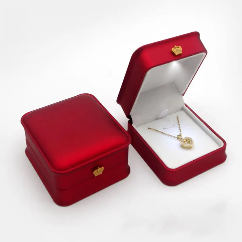 Caja de joyería con luz LED para anillos, collares y regalos