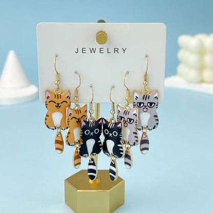 Pendientes colgantes de gato esmaltado con cola