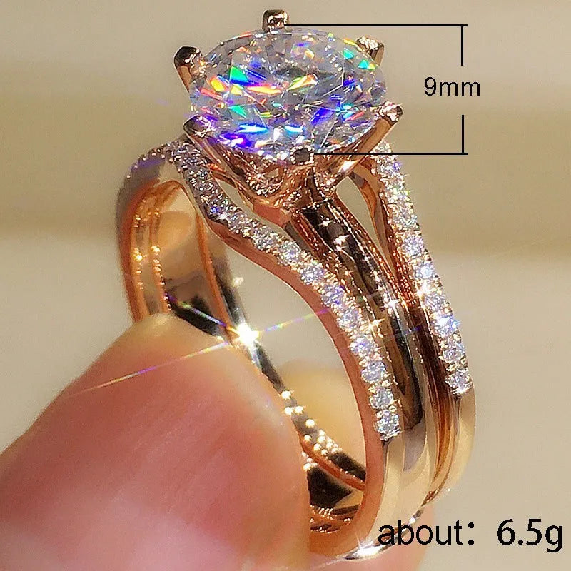 Anillo color oro rosa con circonita de 6 garras