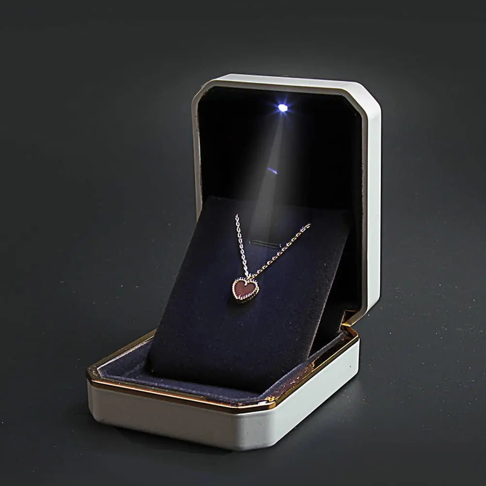 Caja de joyería con luz LED para anillos, collares y regalos