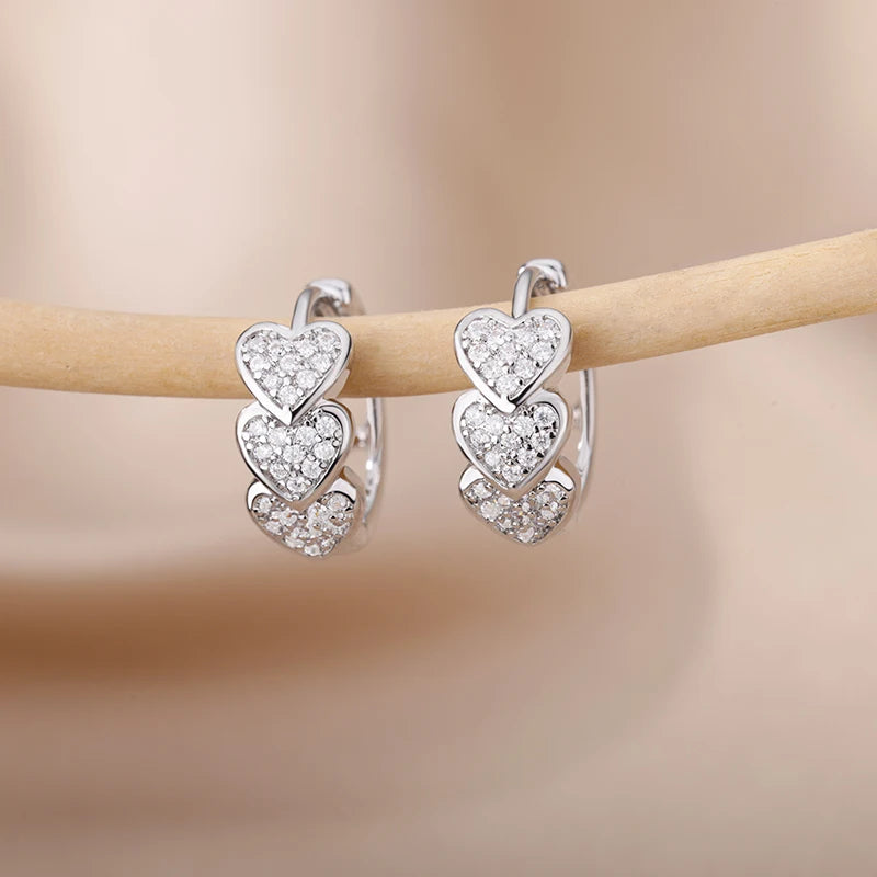 Pendientes aro con estrella de circonita en acero inoxidable