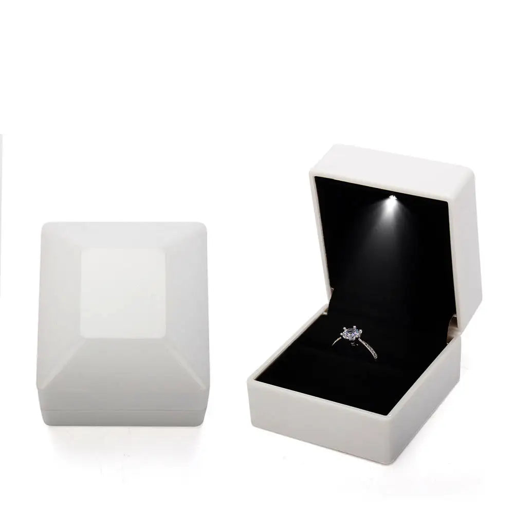 Caja de joyería con luz LED para anillos, collares y regalos