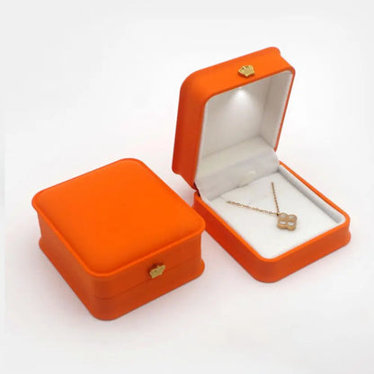 Caja de joyería con luz LED para anillos, collares y regalos