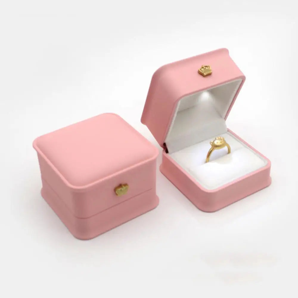 Caja de joyería con luz LED para anillos, collares y regalos