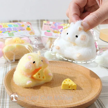 Hámster squishy con queso – juguete antiestrés decorativo