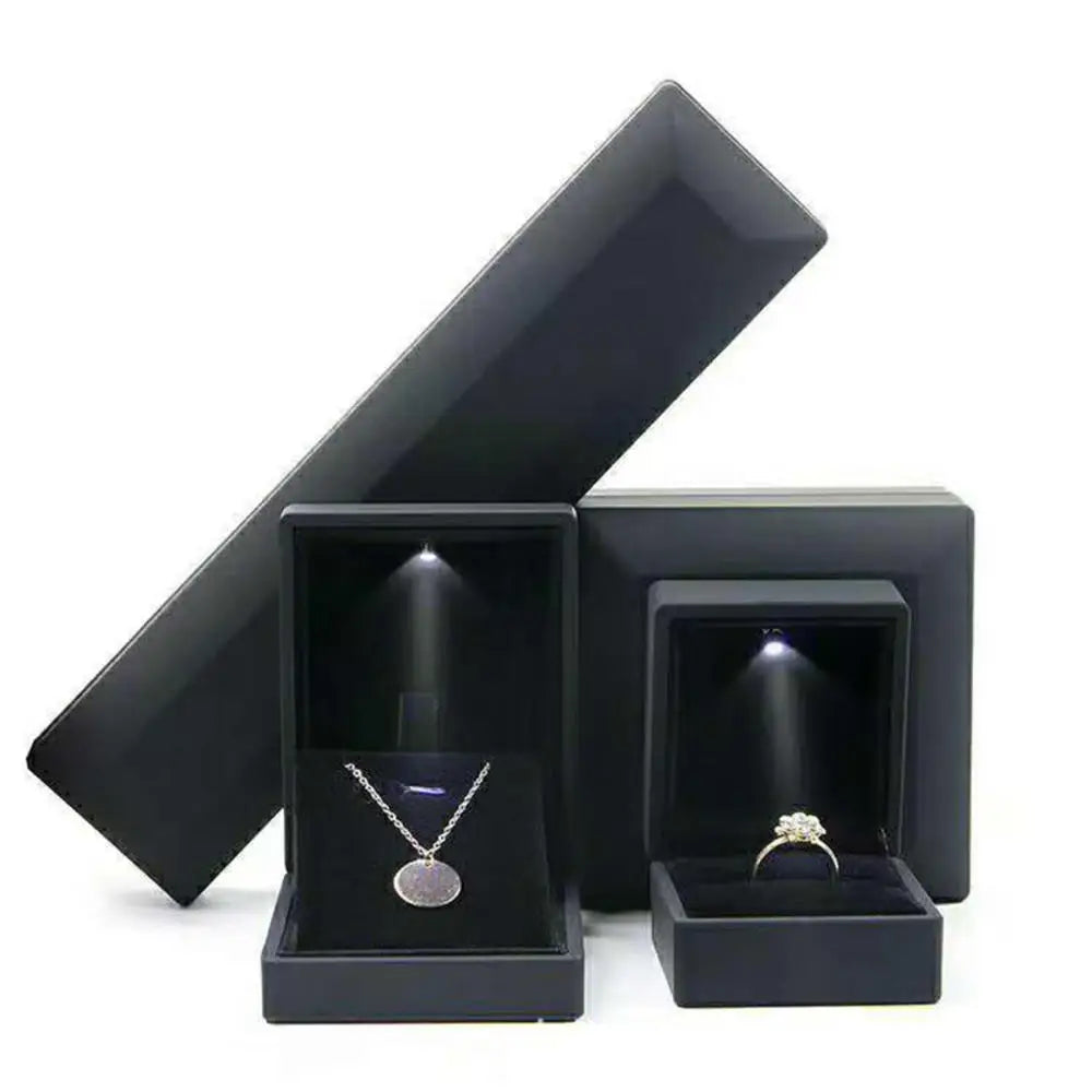 Caja de joyería con luz LED para anillos, collares y regalos