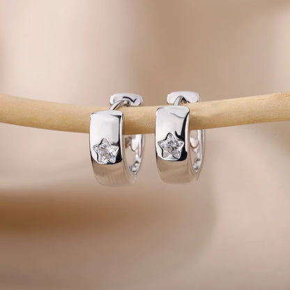 Pendientes aro con estrella de circonita en acero inoxidable