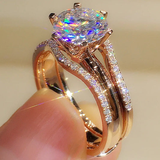 Anillo color oro rosa con circonita de 6 garras