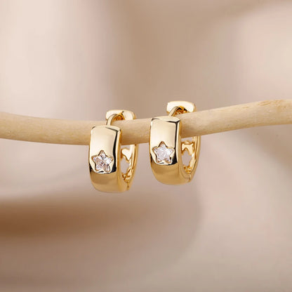 Pendientes aro con estrella de circonita en acero inoxidable